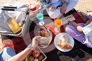 Top view of African American family on picnic on beach