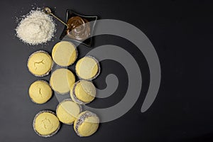 Top view of alfajor with coconut flakes and melted chocolate