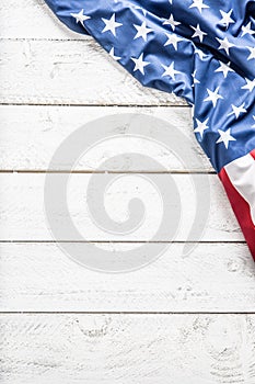 Top of view American flag on white wooden table