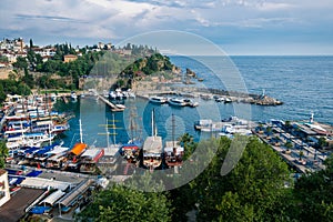 Top view of Antalya city and harbour with moored ships