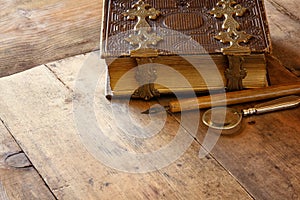 Top view of antique book cover, with brass clasps