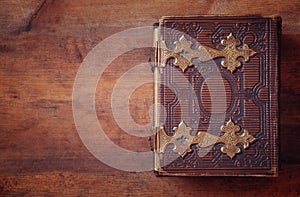 Top view of antique book cover, with brass clasps