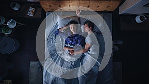Top View Apartment: Happy Young Couple Side Cuddling Together in the Bed Sleeping at Night