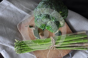 Top view of Asparagus on Cutting Board with Broccoli