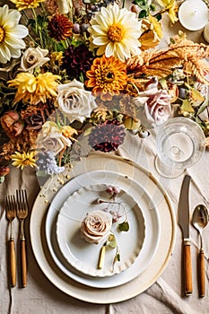 Top view of autumn table scape, autumnal dinner table setting, holiday tablescape for wedding, birthday or party event celebration