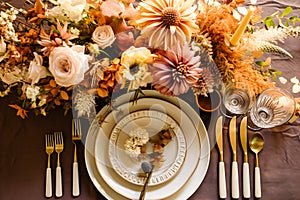 Top view of autumn table scape, autumnal dinner table setting, holiday tablescape for wedding, birthday or party event celebration