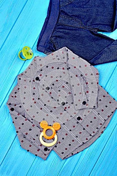 Top view of baby-boy fashion outfit.
