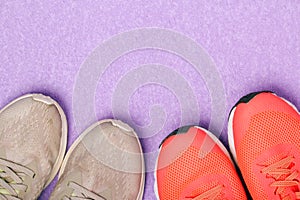 Top view background with two pairs of running shoes