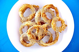 Top view of baked onion rings snack