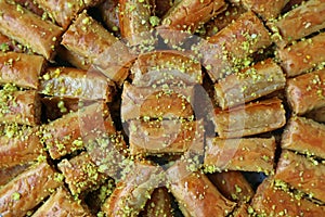 Top View of Baklava Pastries Topped with Chopped Pistachio Nuts