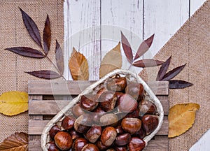 Top view of a basket full of chestnuts