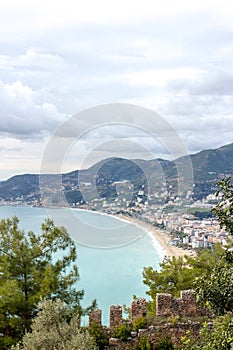 Top view of the bay area, old city, fortress, sea and mountains in Alanya, Turkey