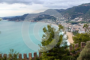 Top view of the bay area, old city, fortress, sea and mountains in Alanya, Turkey