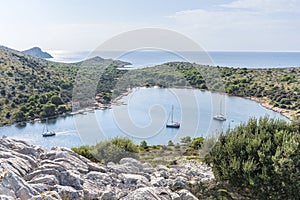 Top view of the Bay with yachts and houses of the village near the island of Lavsa in the Adriatic sea in Croatia photo