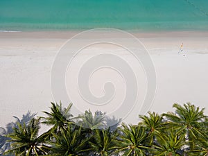 Top view beach sea in sea water clear and beach sand. Green treen at beach.