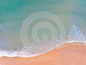 Top view of beach sea surface, Shot in the open sea from above,Amazing nature beach background, Turquoise Water surface waves