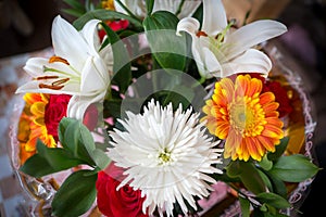 Top view of a beautiful bouquet made up of lilies, roses, chrysanthemums and gerberas for the holiday