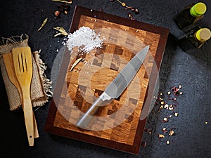 Top view beautiful cutting wooden board and chef knife