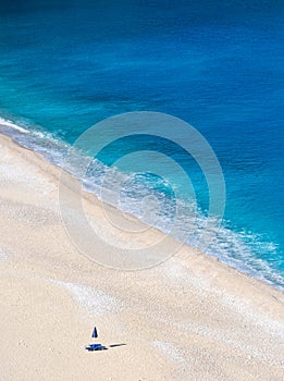 Top view on Beautiful Myrtos beach with turquoise water on the island of Kefalonia in the Ionian Sea in Greece