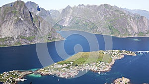 Top view of the beautiful Norwegian village with red houses on the water