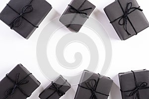 Top view of Black Friday Sale text with black gift box on white background. Shopping concept boxing day and black Friday