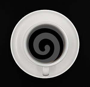 Top view of black hot coffee with white ceramic cup.