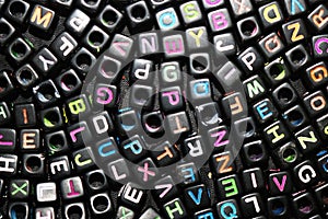 Black Plastic dice, cubes with letters image photo