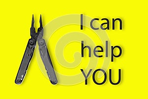 Top view of black pliers of  multi tool on white backround with empty space. Business and craft concept