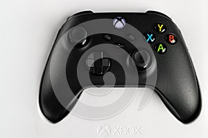 Top View Of Black Xbox Wireless Controller In White Retail Packaging