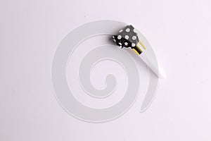 Top view of blowouts whistle isolated on a white background