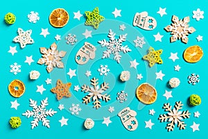 Top view of blue background with New Year toys and decorations. Christmas time concept