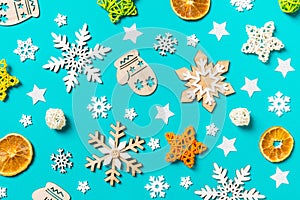 Top view of blue background with New Year toys and decorations. Christmas time concept