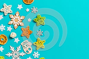 Top view of blue background with New Year toys and decorations. Christmas time concept with copy space