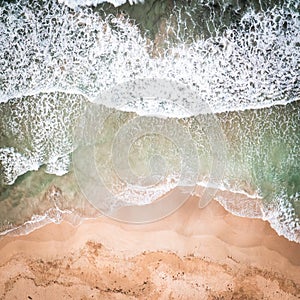 Top view of blue frothy sea surface. Shot in the open sea from above.