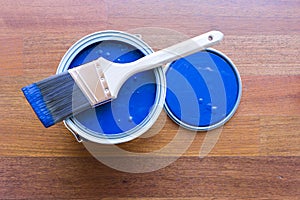 Top View of Blue House Paint Can and Brush