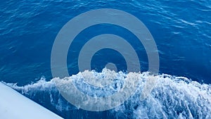 Top of the view of blue sea wave movement from the boat, concept of turist travel holiday