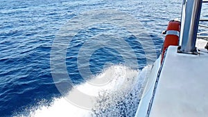 top of the view of blue sea wave movement from the boat, concept of turist travel holiday
