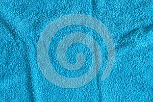 Top view of Blue Towel texture. Blue Towel Fabric Texture Background. Close-up. Blue  natural cotton towel background.