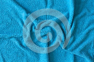 Top view of Blue Towel texture. Blue Towel Fabric Texture Background. Close-up. Blue natural cotton towel background.