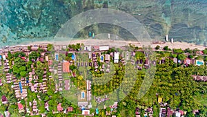 Top view of the blue water coast line in Gili Air island.