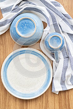 Top view of blue and white dish with upturn bowl and cup