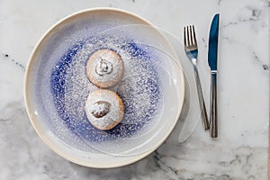 Top view of Bombolone is an Italian filled doughnut and is eaten as a snack food and dessert