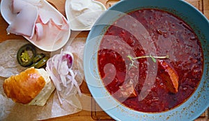 Top view of Borsch with side dishes