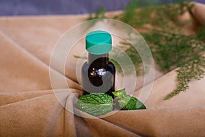 Top View of Bottle with Mint Oil essential oil or tonic water