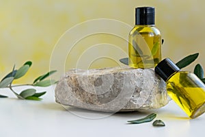 Top view of bottles essential olive oil. Healthy natura cosmetic treatment, massage product