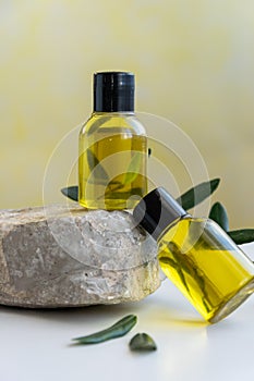 Top view of bottles essential olive oil. Healthy natura cosmetic treatment, massage product