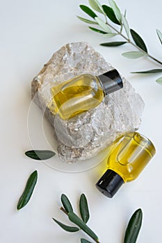 Top view of bottles essential olive oil. Healthy natura cosmetic treatment, massage product