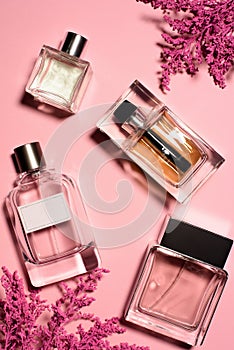 top view of bottles of perfumes photo