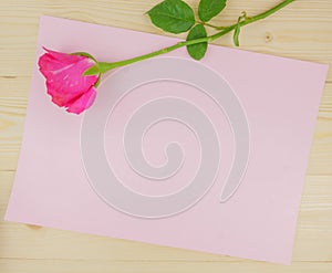 Top view bouquet of pink rose on wooden background