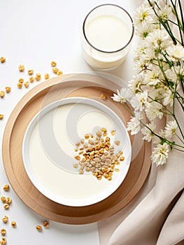 Top view of bowl of cereals with milk.